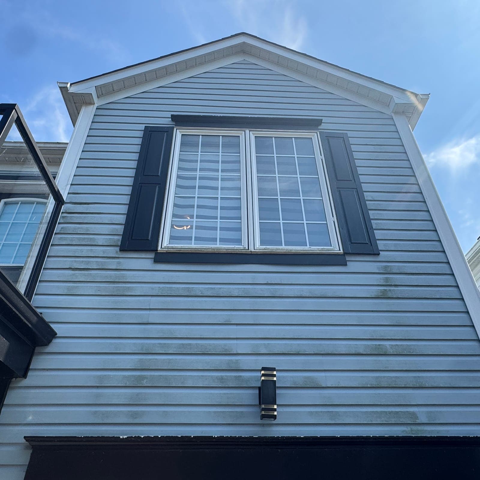 Before — Heavy gable streaking wiped clean