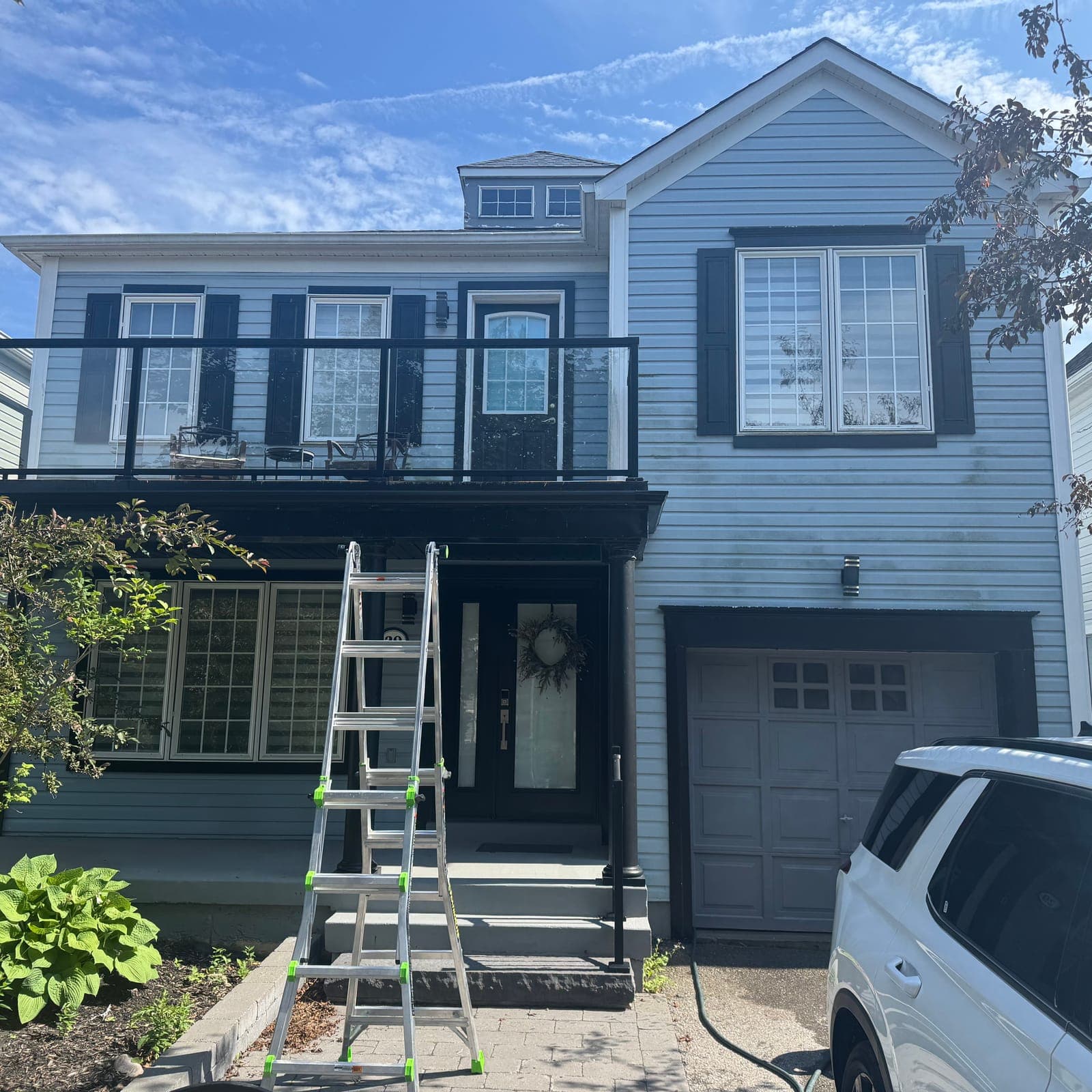 Before — Whole-home soft wash, front to gable