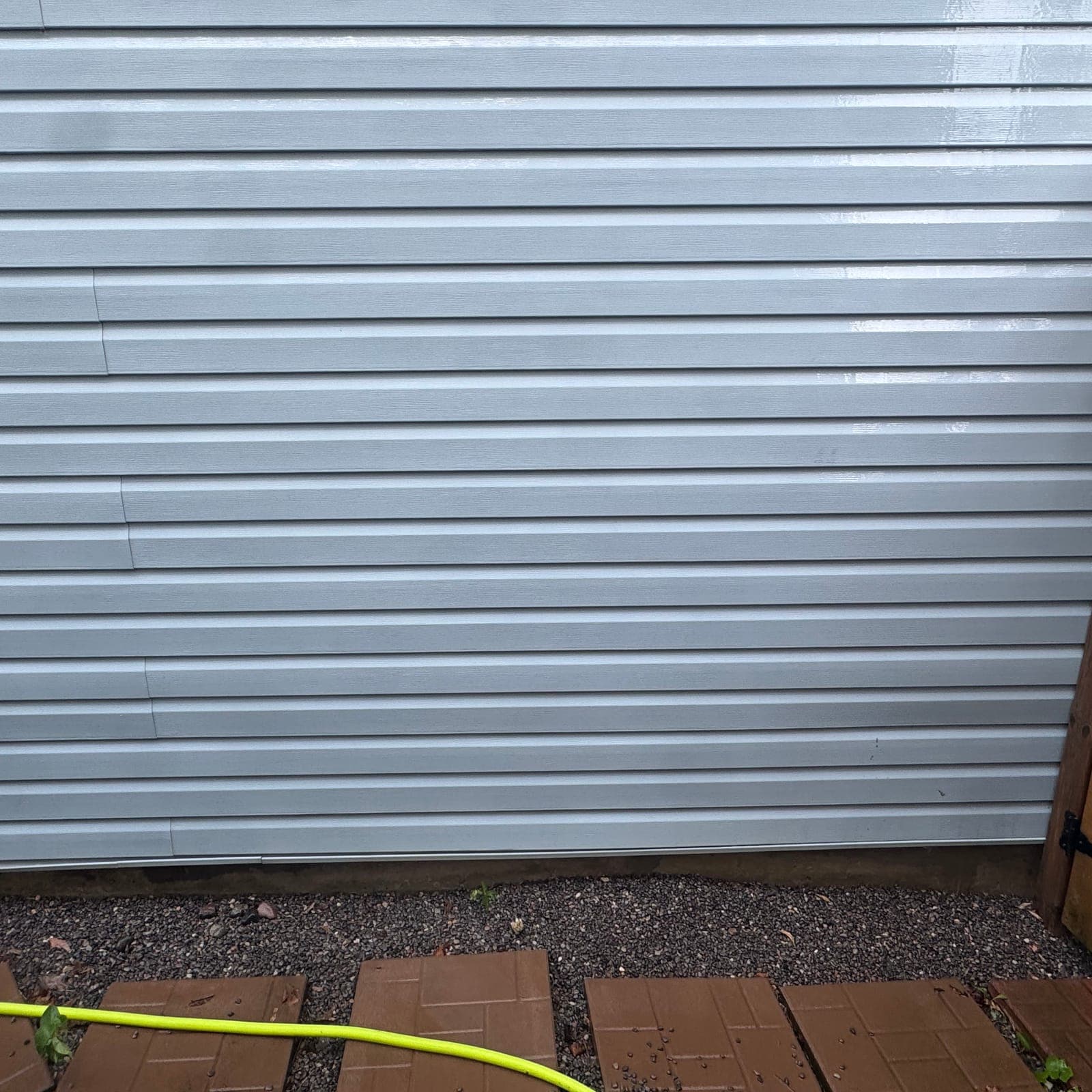 After — Algae streaks washed off the side wall