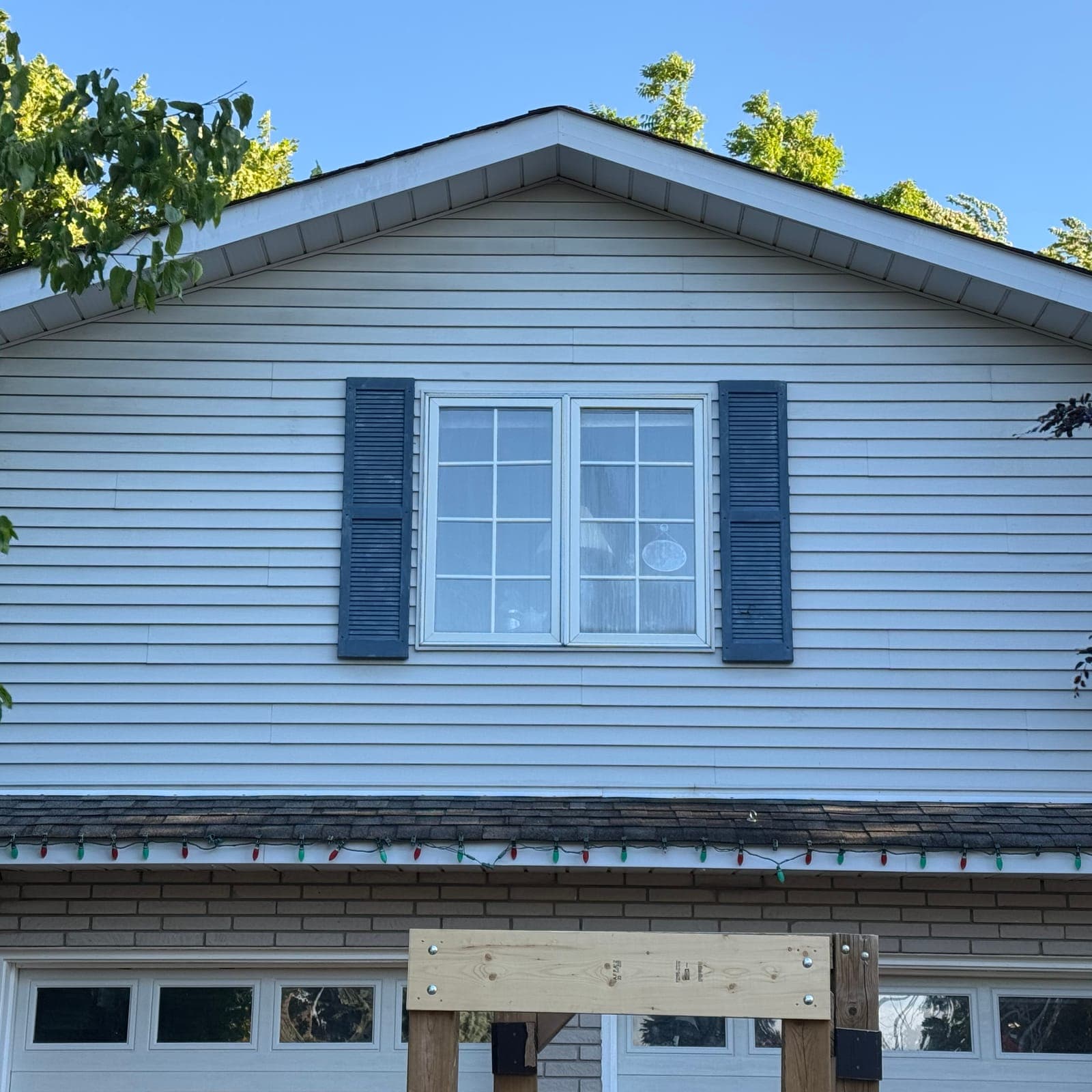 After — Streaked siding, bright again